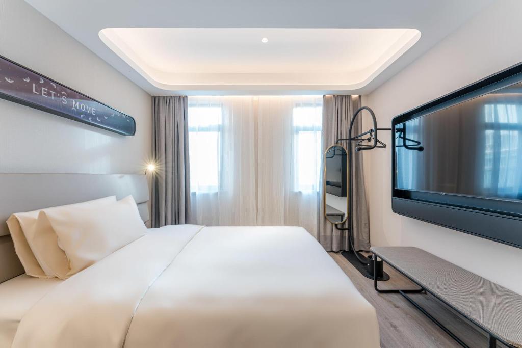 TV a/nebo společenská místnost v ubytování Atour Light Hotel Shanghai Xujiahui Jiaotong University