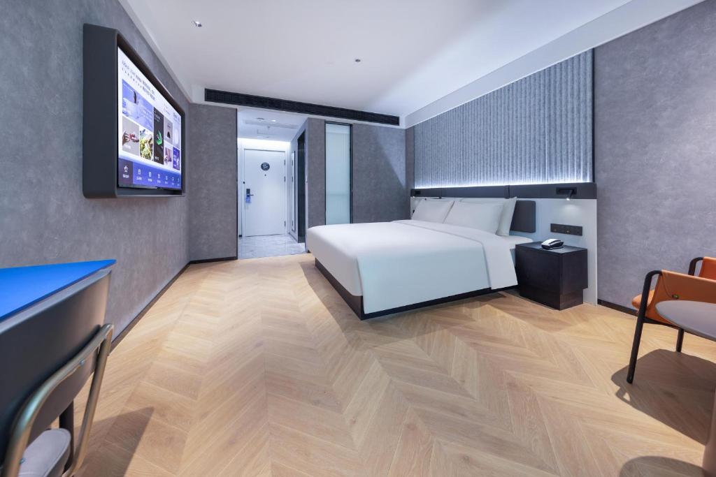Postel nebo postele na pokoji v ubytování Atour Light Hotel Fuzhou Sanfang Qixiang