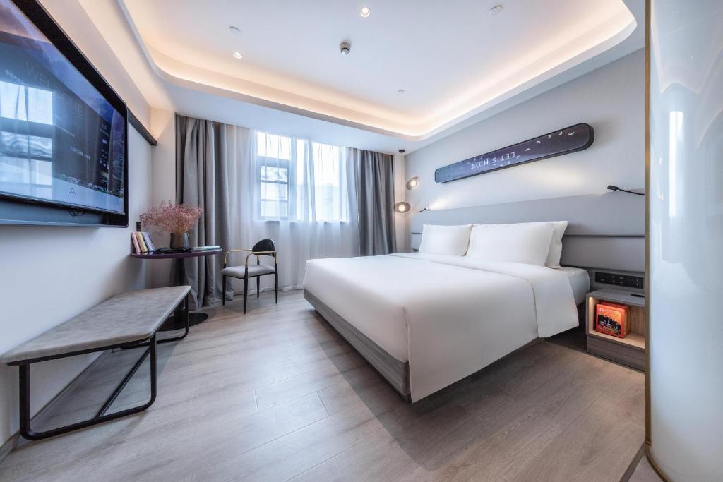 Postel nebo postele na pokoji v ubytování Atour Light Hotel Shanghai Pudong Zhangjiang Park Riverside