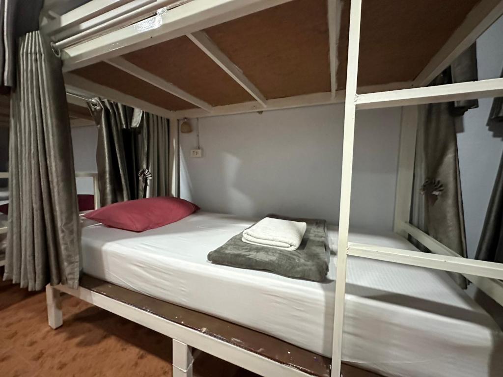 Postel nebo postele na pokoji v ubytování Hangover Hostel