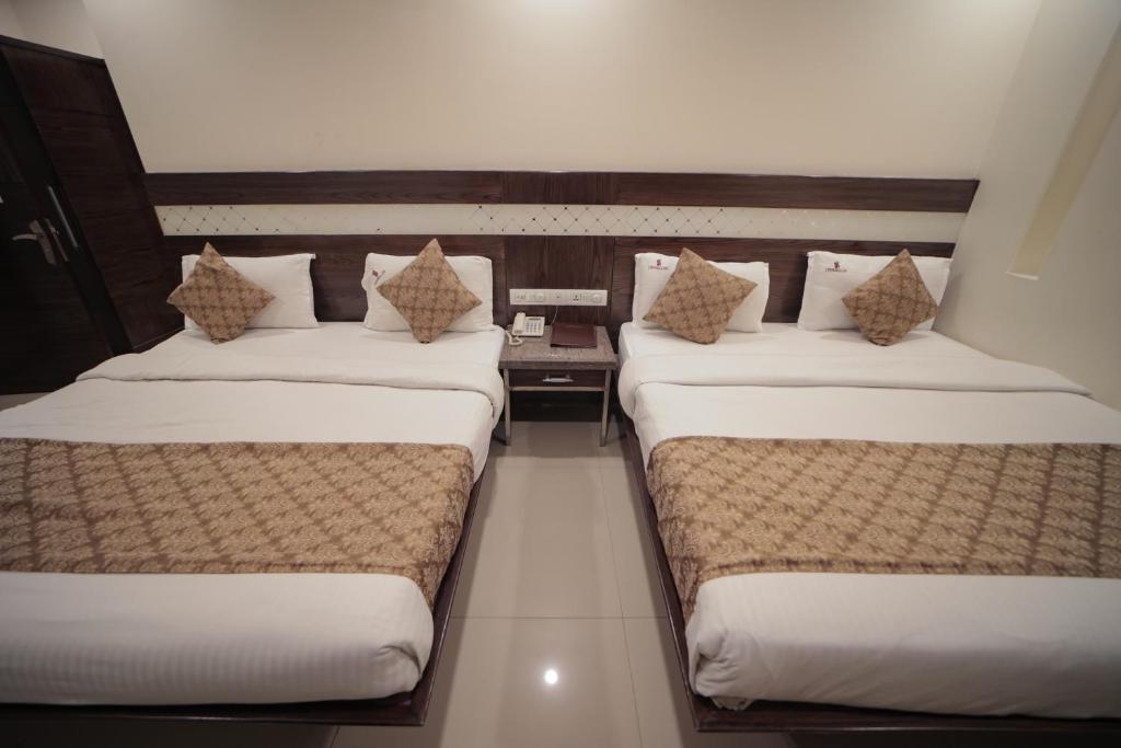 Postel nebo postele na pokoji v ubytování Hotel Stay Well Dx
