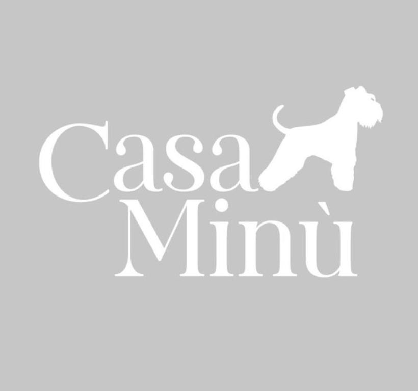 a horse logo with the words as a minivan at Casa Minù in Viareggio