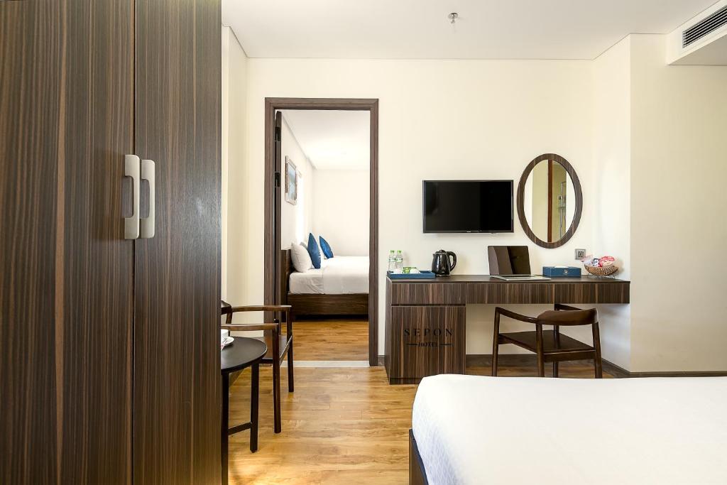 TV a/nebo společenská místnost v ubytování Sepon Blue Hotel