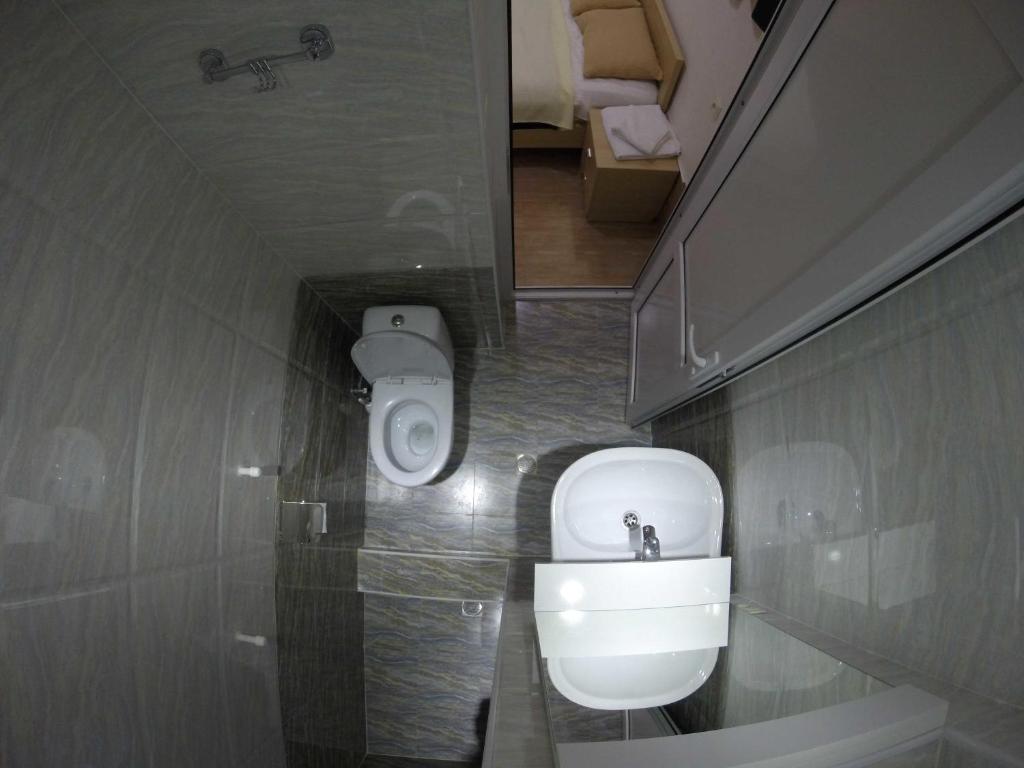 Koupelna v ubytování Guest House Rampa