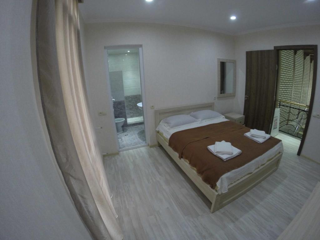 Postel nebo postele na pokoji v ubytování Guest House Rampa