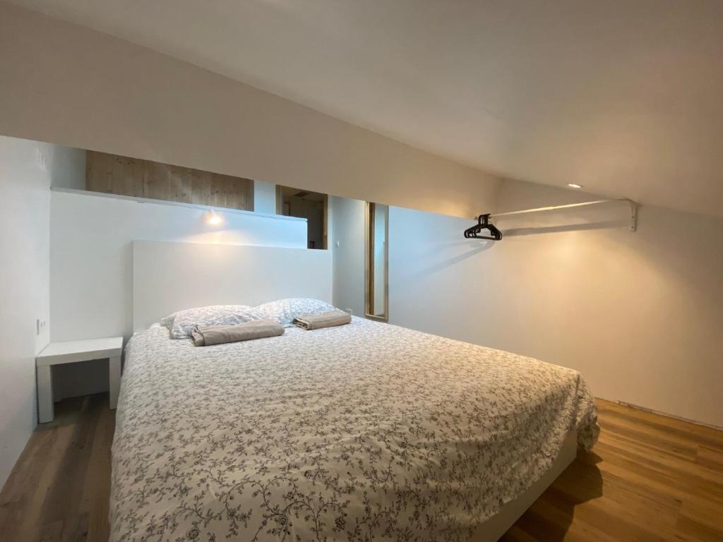 Postel nebo postele na pokoji v ubytování Bohobos Hostel