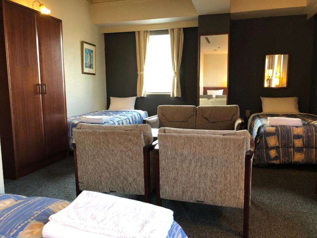 Postel nebo postele na pokoji v ubytování Hotel 28 Hiroshima
