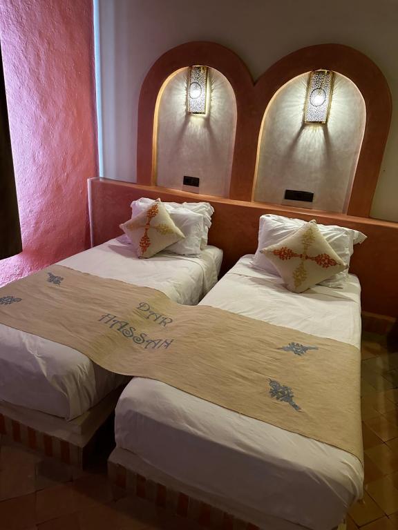 Postel nebo postele na pokoji v ubytování Dar Hassan Merzouga