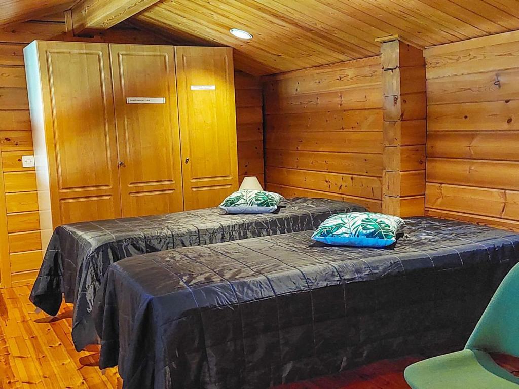Postel nebo postele na pokoji v ubytování Holiday Home Petäjälahti by Interhome