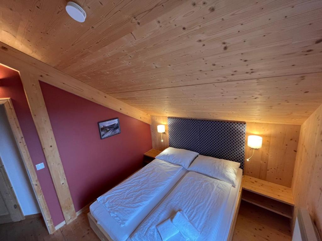 Voodi või voodid majutusasutuse Chalet Klippitz - Perle by Interhome toas