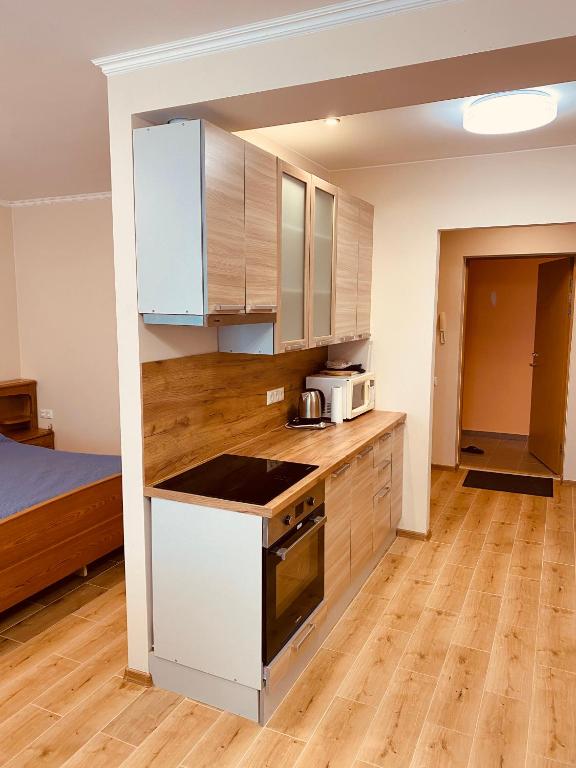 Kuchyň nebo kuchyňský kout v ubytování Appartament Karja 26A/10