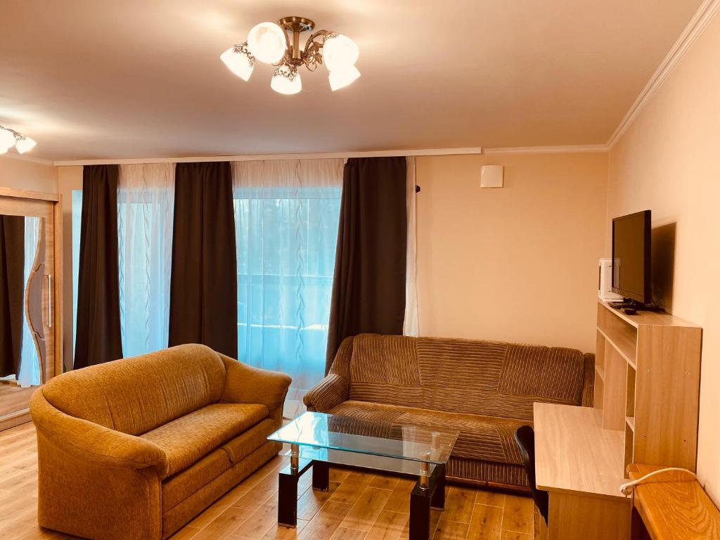 TV a/nebo společenská místnost v ubytování Appartament Karja 26A/10