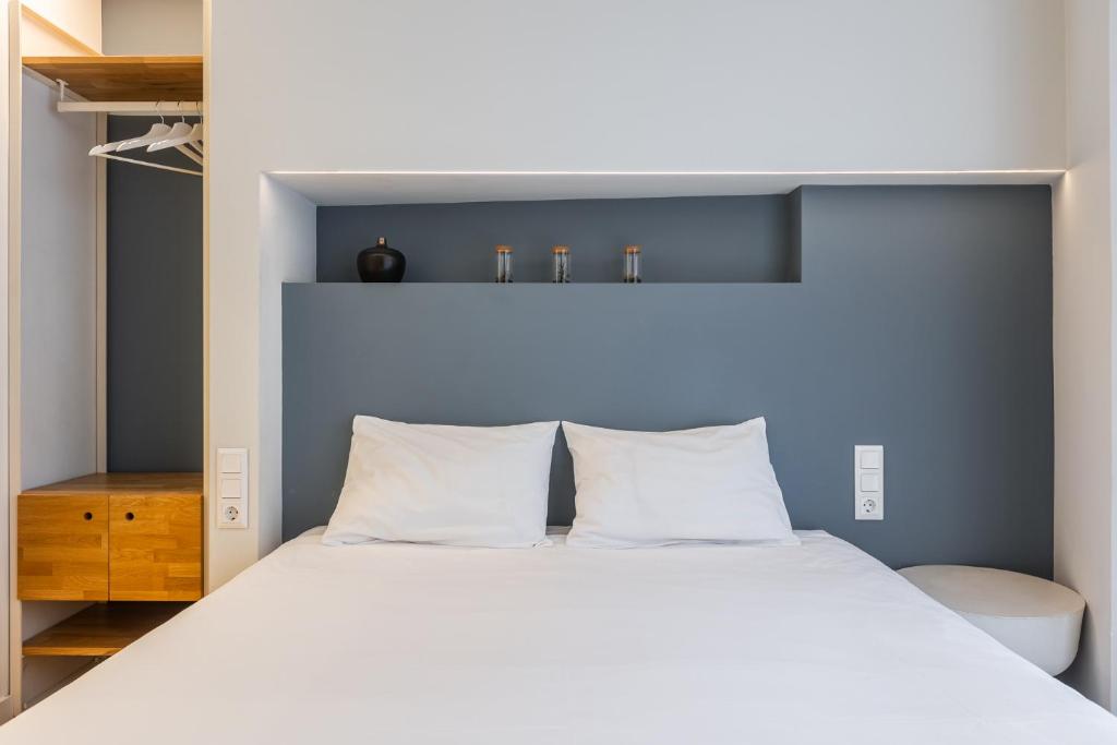Posteľ alebo postele v izbe v ubytovaní Syntagma Apartments by Olala Homes