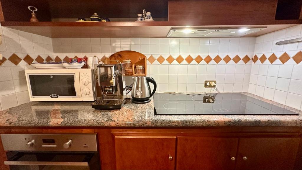 A kitchen or kitchenette at Dimora Corte Lubelli