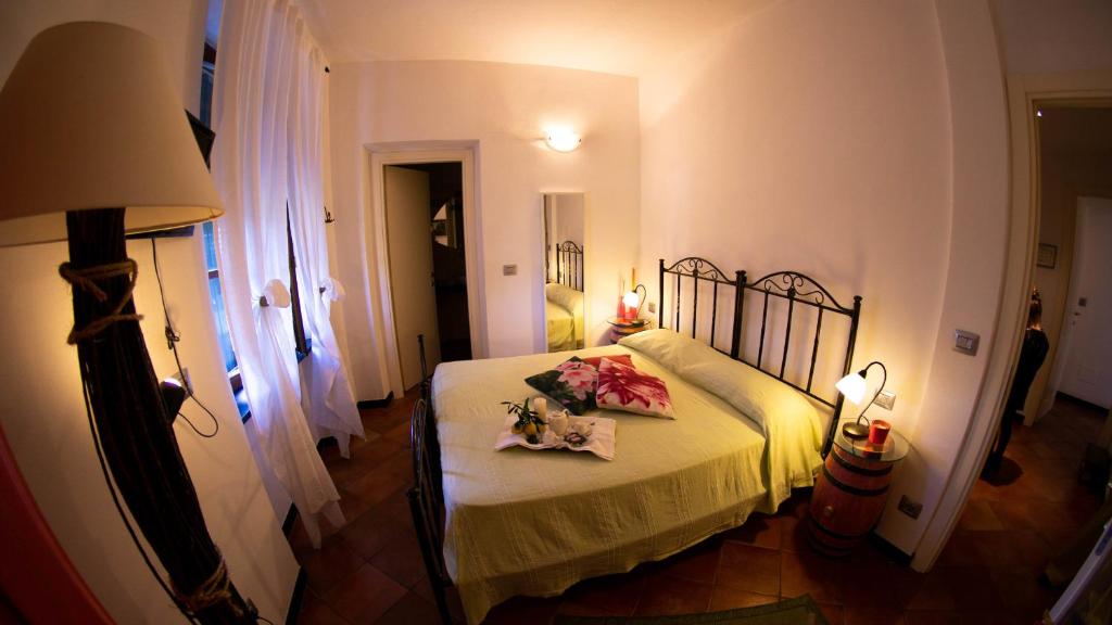 Postel nebo postele na pokoji v ubytování Rooms and Breakfast da Carla