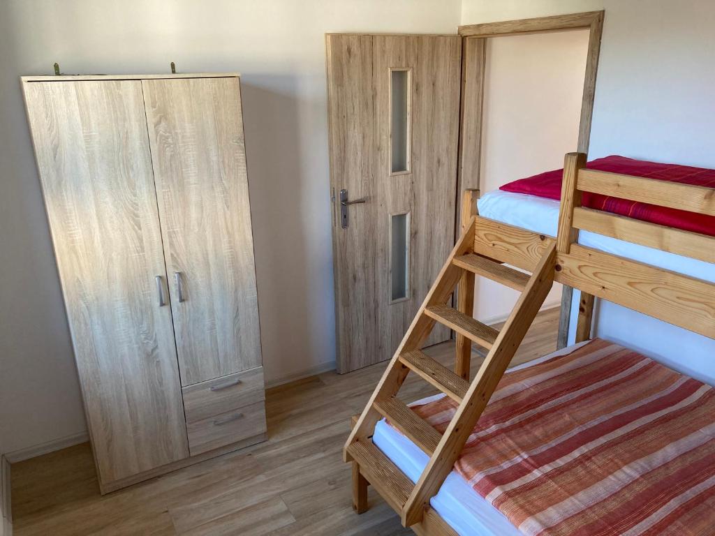 Łóżko lub łóżka w pokoju w obiekcie Sofia Dwupoziomowe Apartamenty