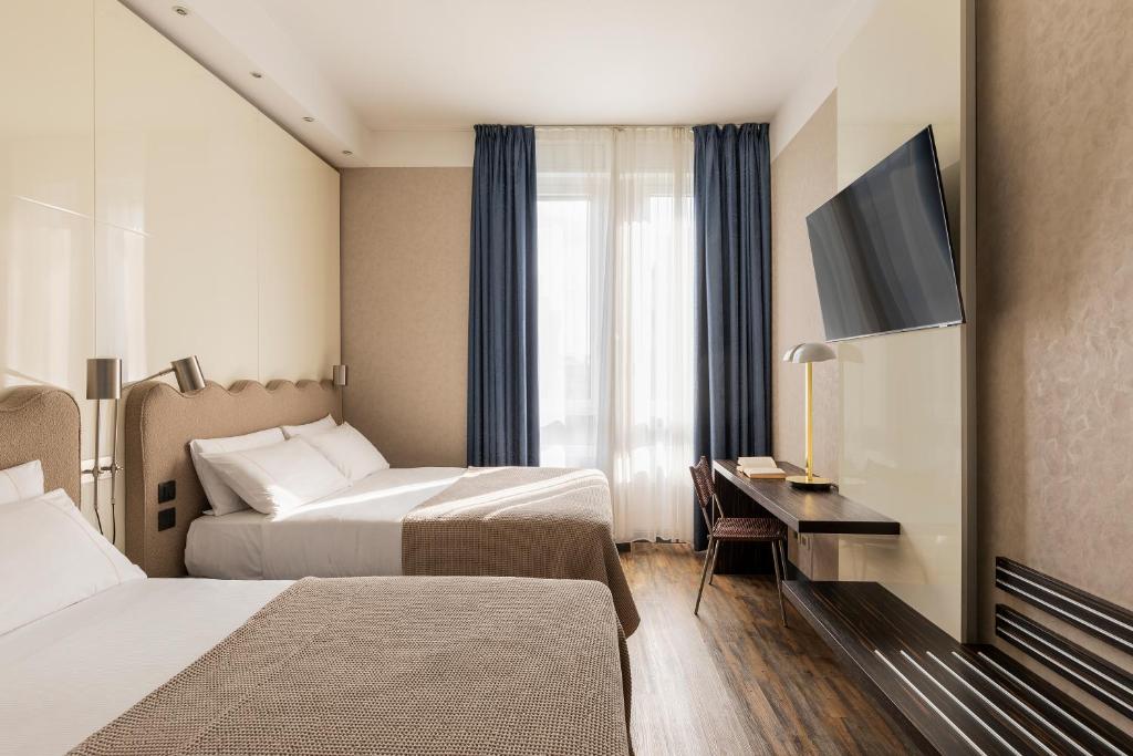 Postel nebo postele na pokoji v ubytování c-hotels Atlantic