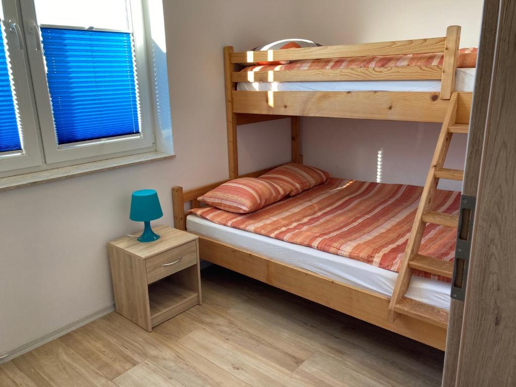 Łóżko lub łóżka w pokoju w obiekcie Sofia Dwupoziomowe Apartamenty