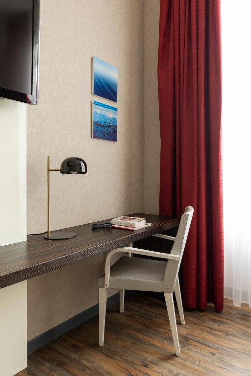 TV a/nebo společenská místnost v ubytování c-hotels Atlantic