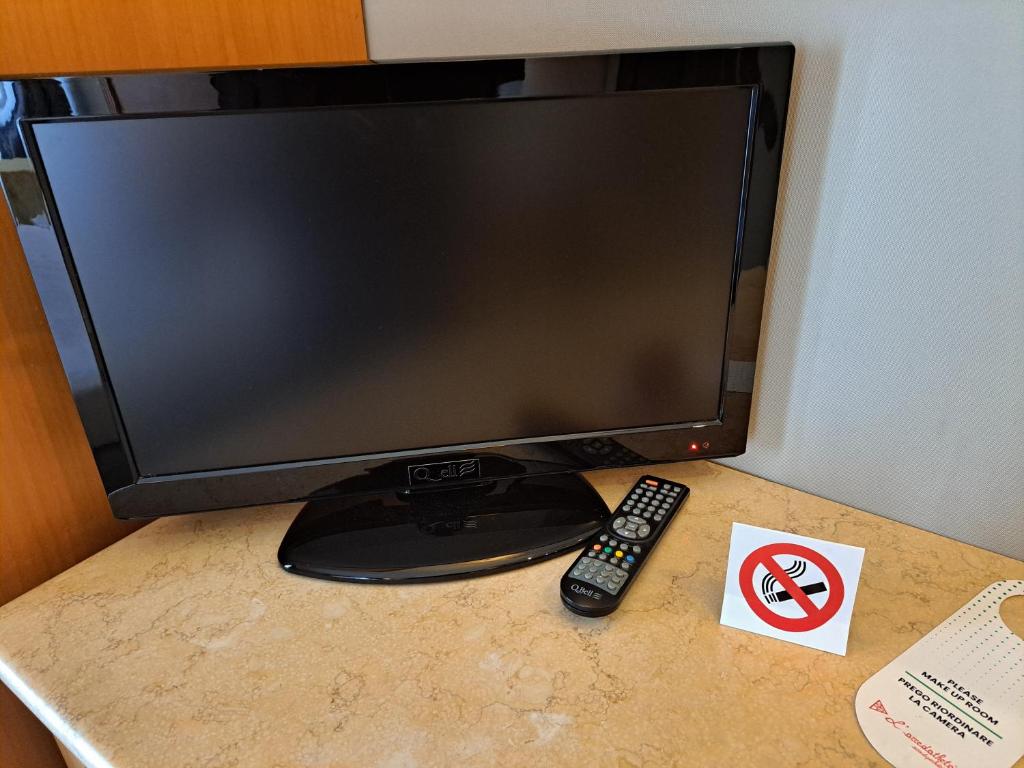 TV a/nebo společenská místnost v ubytování Hotel dei Quiriti