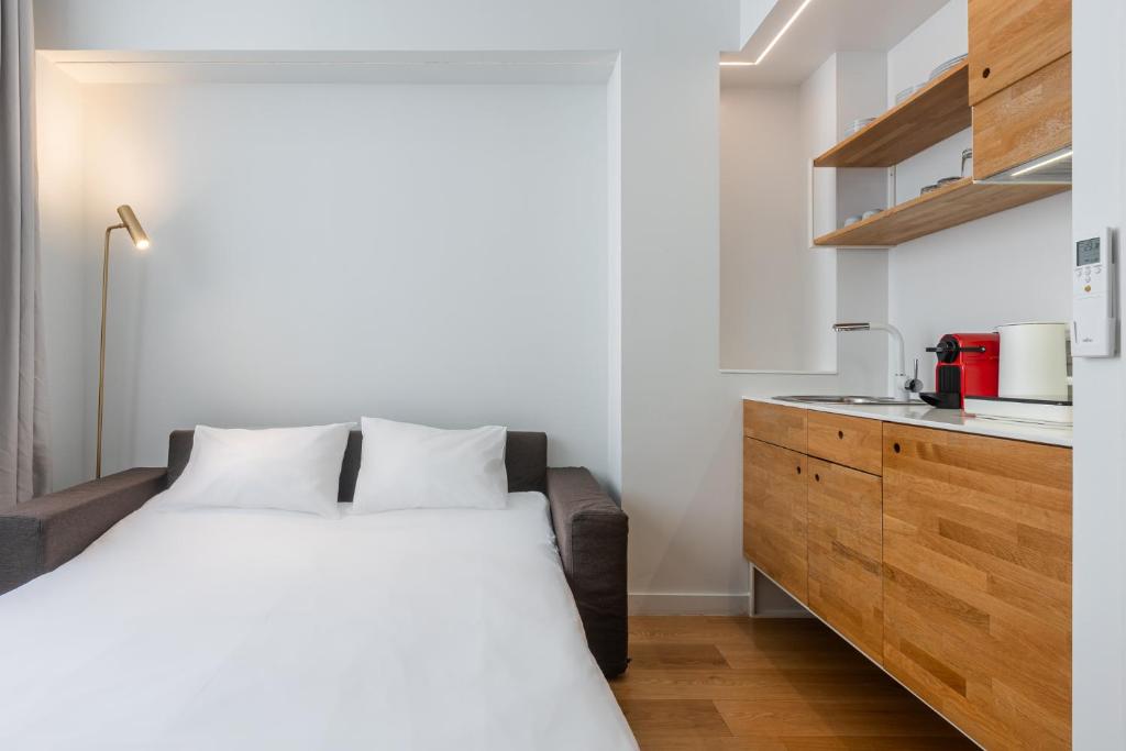 Posteľ alebo postele v izbe v ubytovaní Syntagma Apartments by Olala Homes