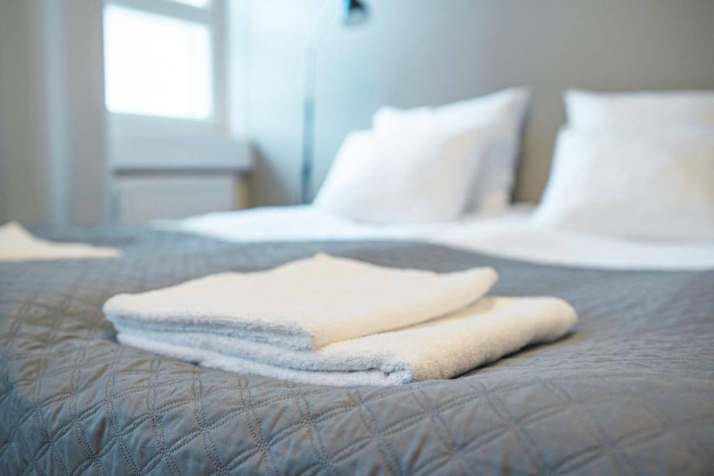 Katil atau katil-katil dalam bilik di Hotelli Sointula