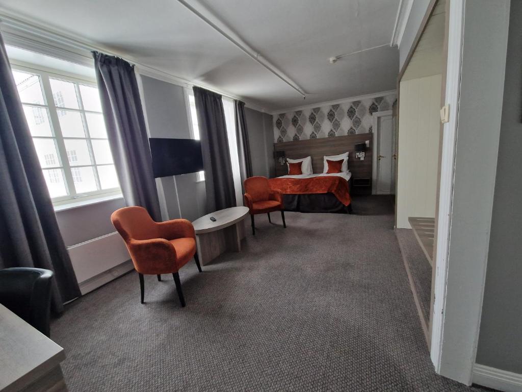 Posezení v ubytování Dr. Holms Hotel