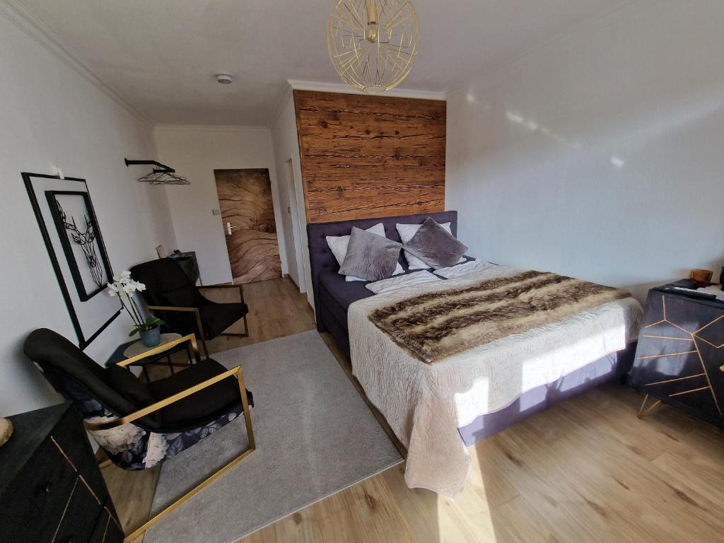 Postel nebo postele na pokoji v ubytování Sonnenhang Apartment