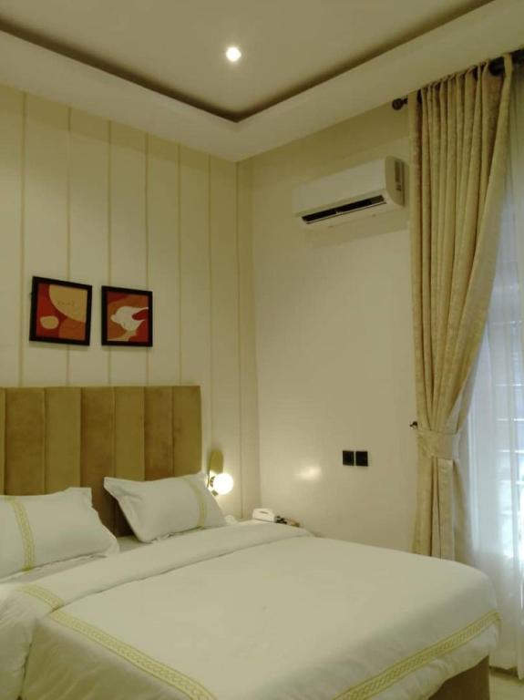 Letto o letti in una camera di Elcastillo Homes