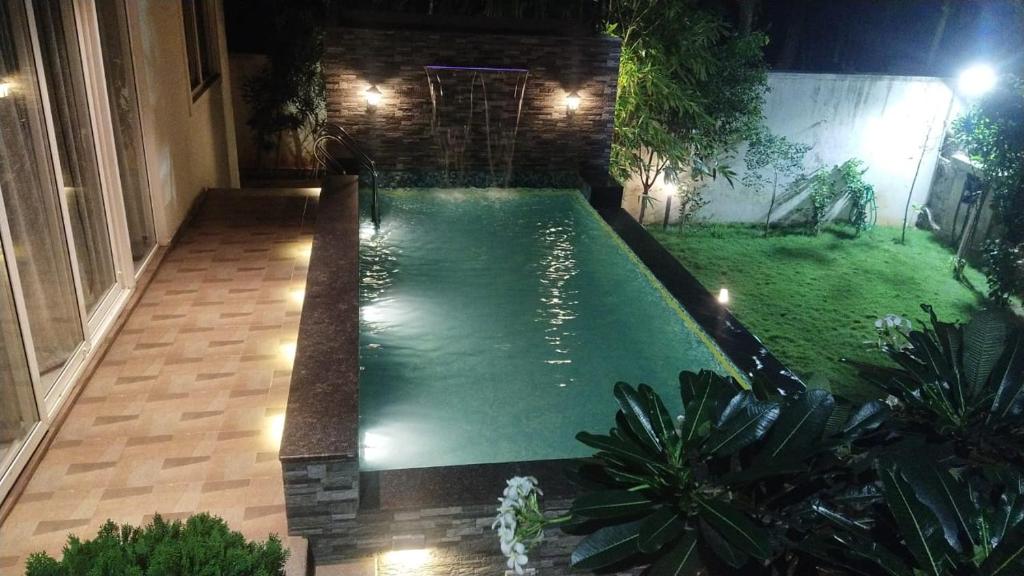 Bazén v ubytování Mer Vue Villa, Kovalam, ECR, Chennai nebo v jeho okolí