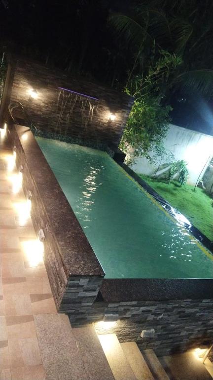 Bazén v ubytování Mer Vue Villa, Kovalam, ECR, Chennai nebo v jeho okolí