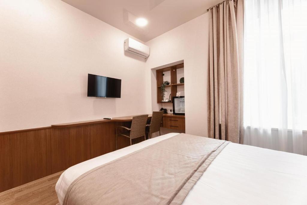 TV a/nebo společenská místnost v ubytování Park Hotel Tskaltubo - Balneo Resort