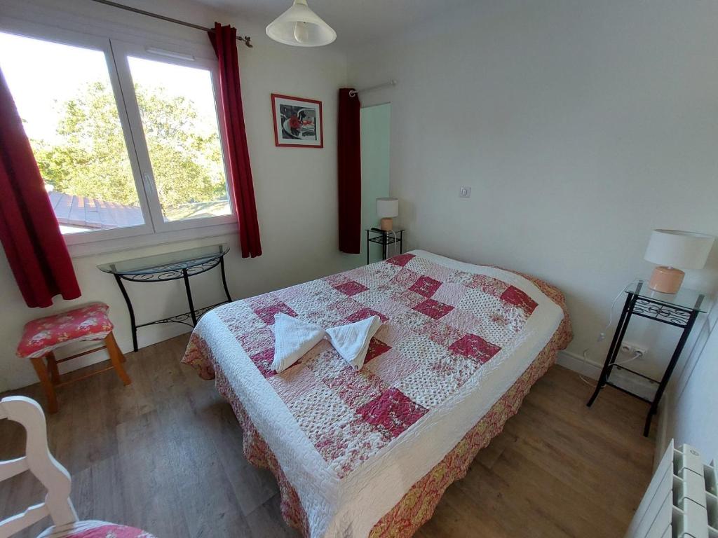 Postel nebo postele na pokoji v ubytování Hotel au Charme du Levat