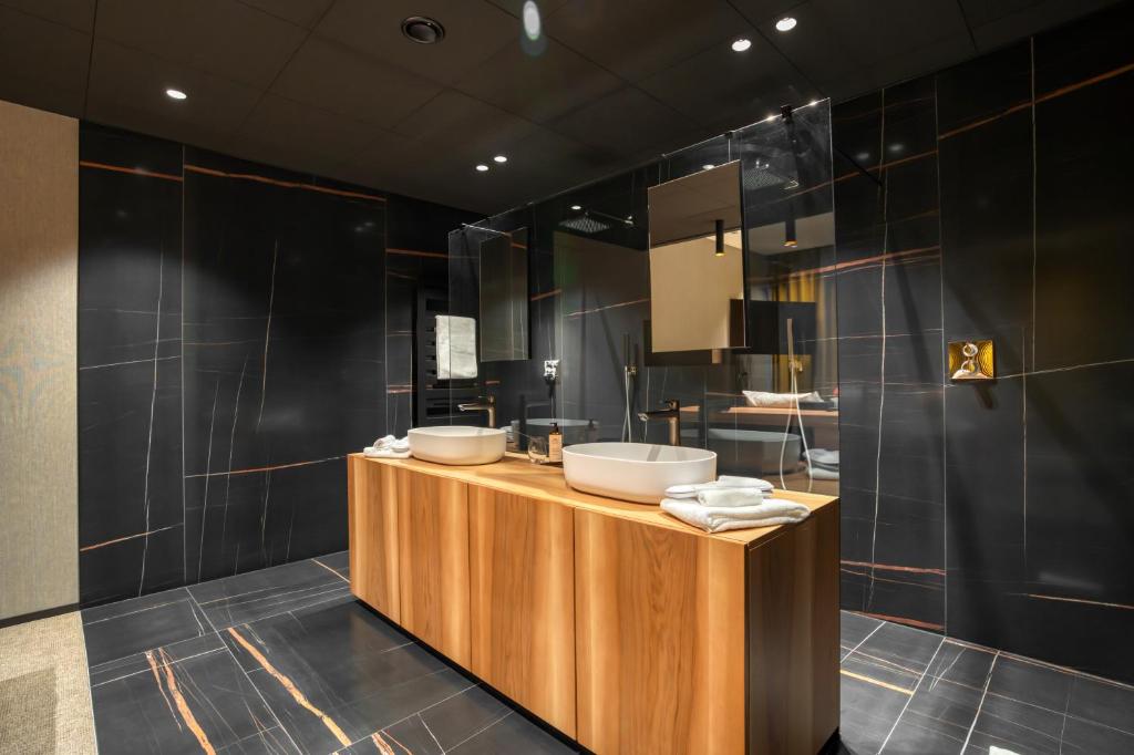 Kuchyň nebo kuchyňský kout v ubytování Aux Etangs - Hôtel