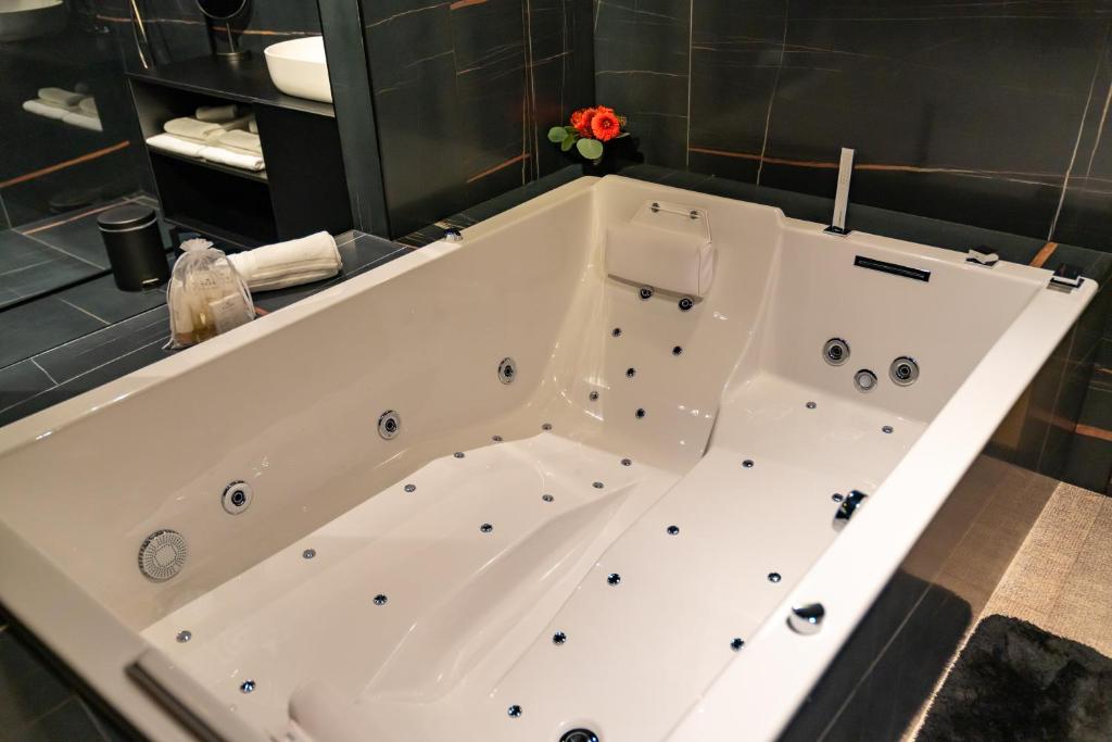 Koupelna v ubytování Aux Etangs - Hôtel