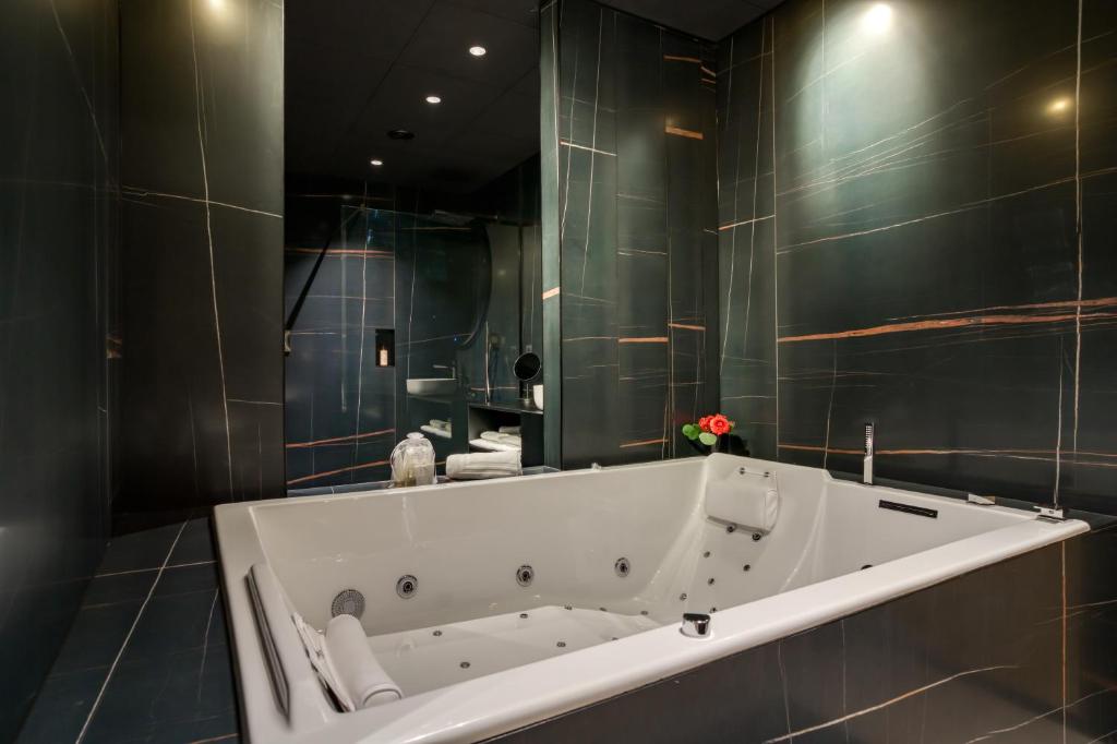 Koupelna v ubytování Aux Etangs - Hôtel