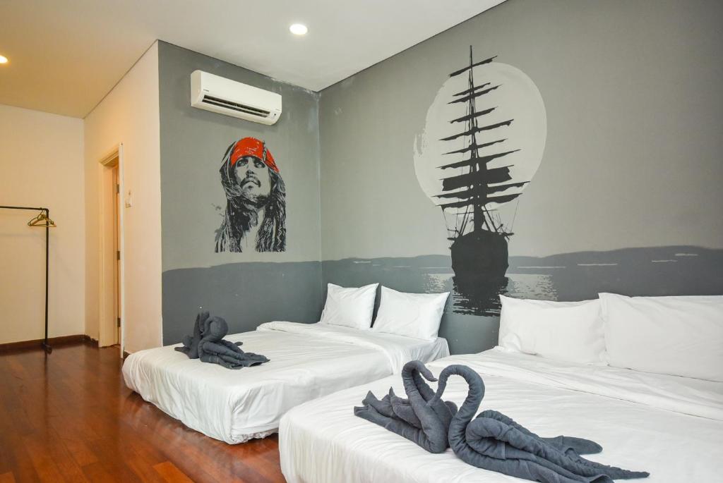 Katil atau katil-katil dalam bilik di 1Medini Theme Suite by Nest Home【LEGOLAND】