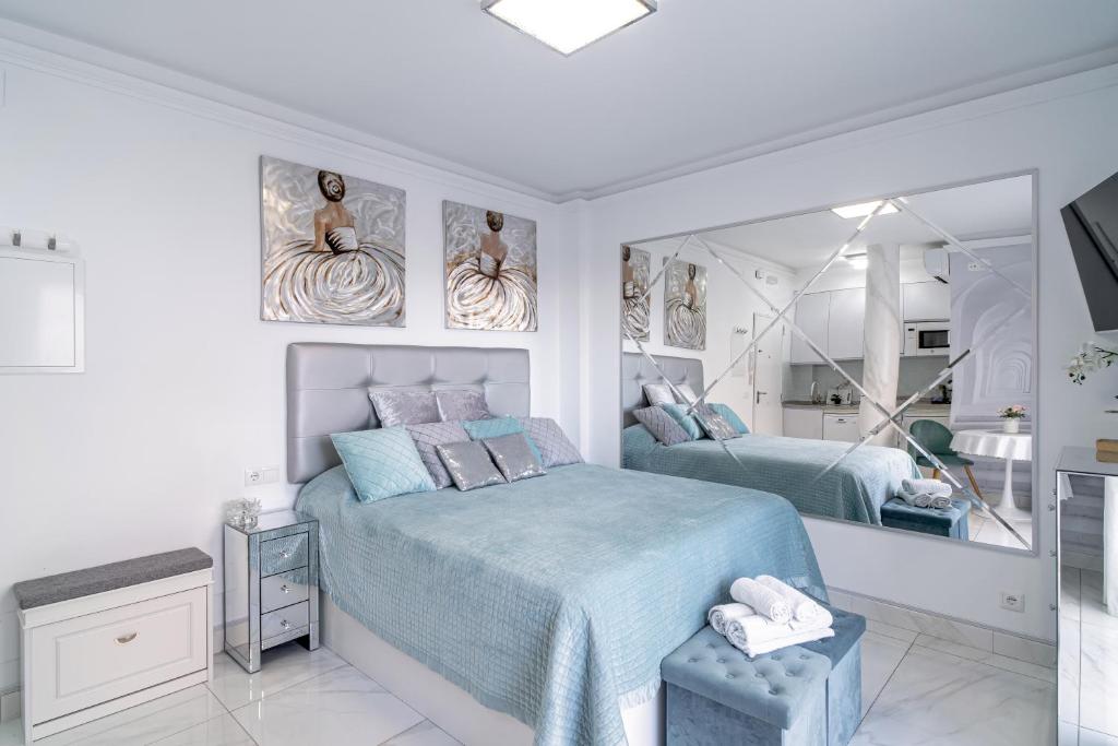 Postel nebo postele na pokoji v ubytování Silver horizon Luxury apartment