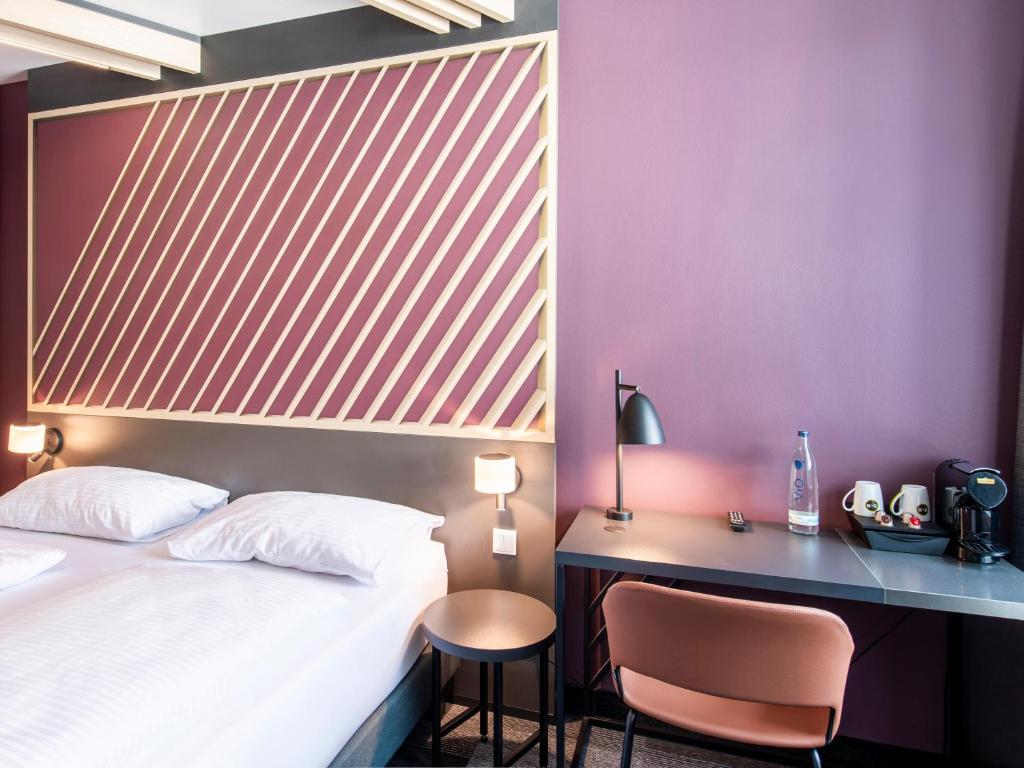 Postel nebo postele na pokoji v ubytování B&B Hotel Nürnberg-Hbf