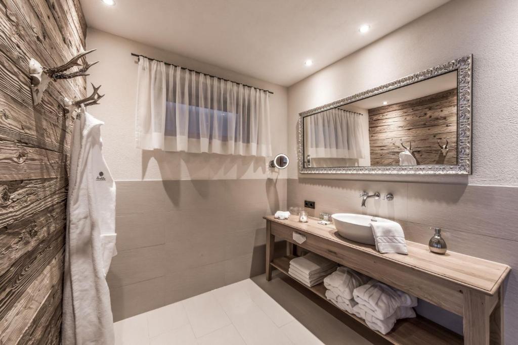 Kúpeľňa v ubytovaní Aadla Walser-Chalets mit privater Sauna, Hotpot und Hotelservice