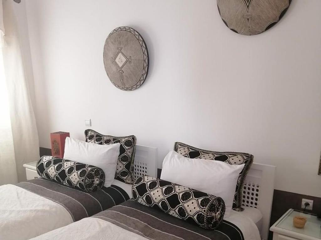 Postel nebo postele na pokoji v ubytování Dar 14 Marrakech