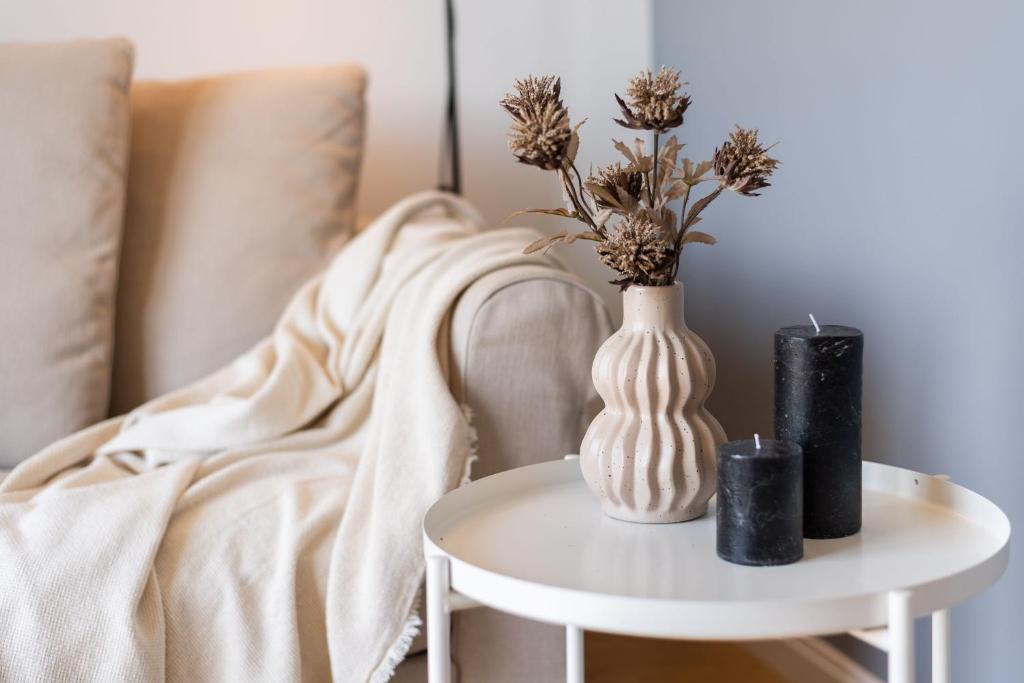 Posteľ alebo postele v izbe v ubytovaní Flatbook - City Center SPA Apartments Toruńska 11