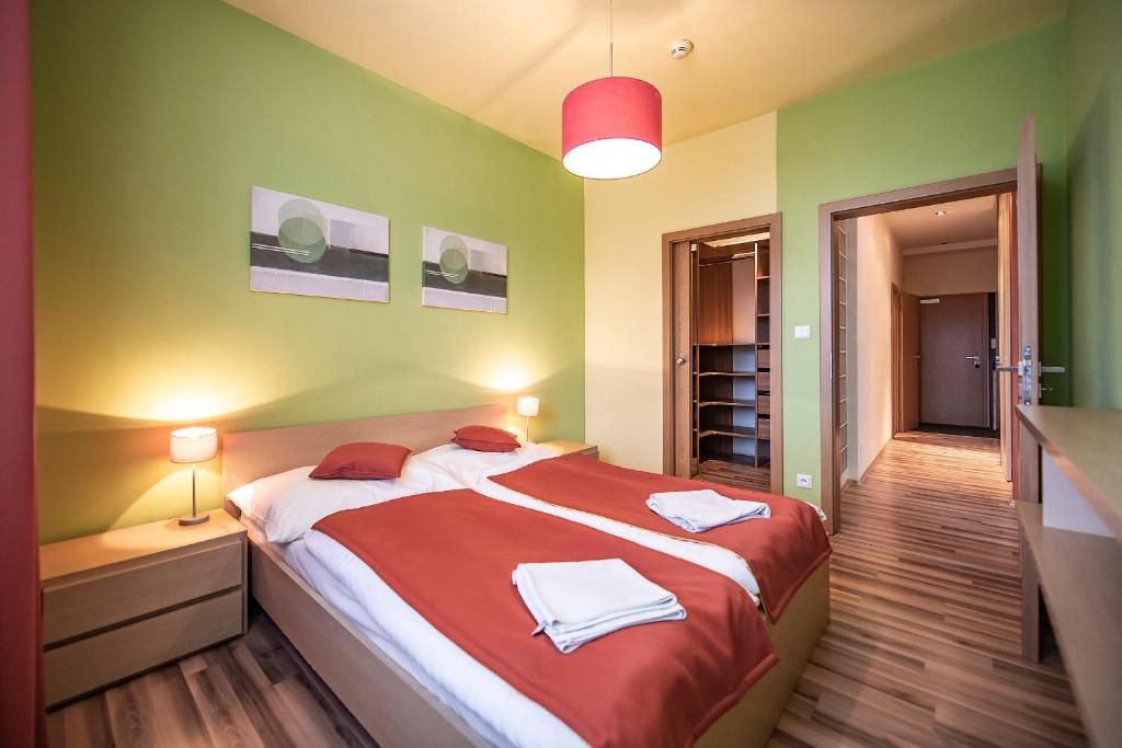 Postel nebo postele na pokoji v ubytování Hotel Spolcentrum