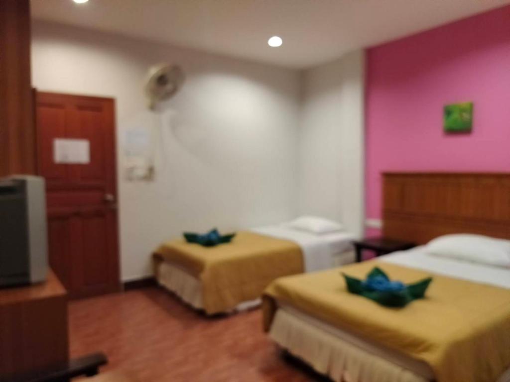 Postel nebo postele na pokoji v ubytování N.D.Hotel