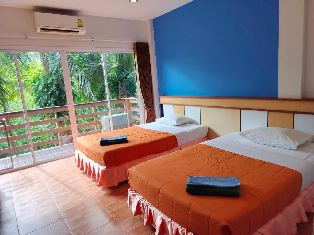 Postel nebo postele na pokoji v ubytování N.D.Hotel