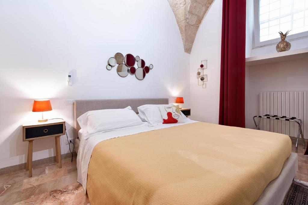 Postel nebo postele na pokoji v ubytování Kalinifta - Lecce Selection