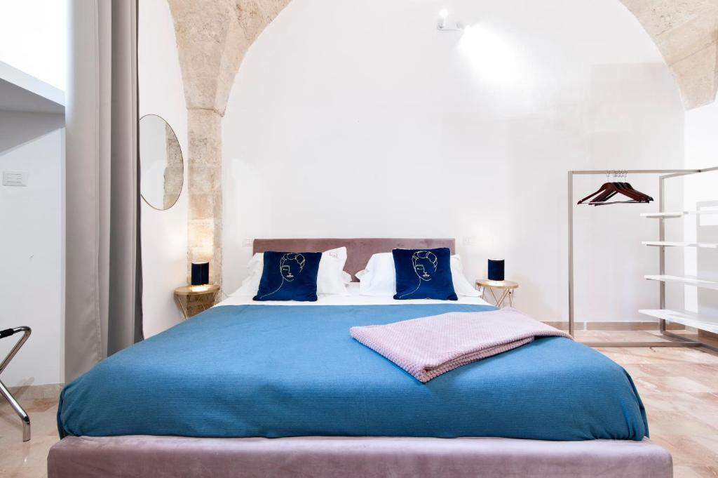 Postel nebo postele na pokoji v ubytování Kalinifta - Lecce Selection