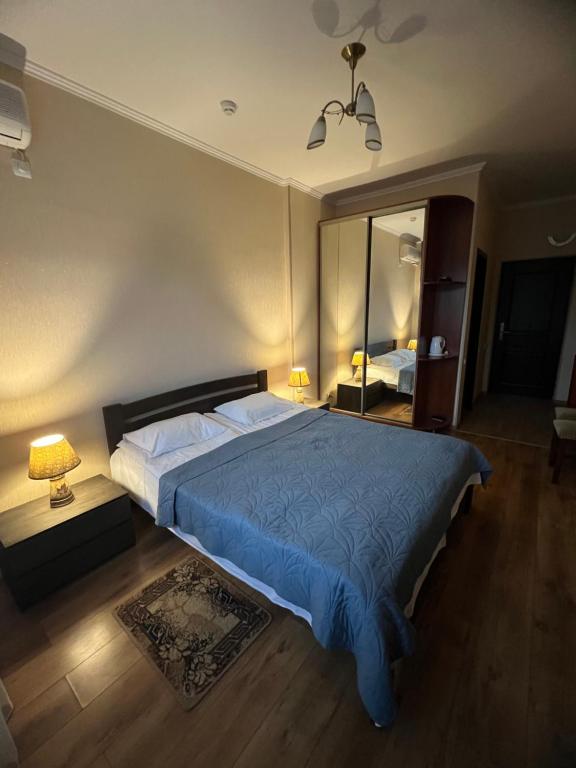 Postel nebo postele na pokoji v ubytování Lileya Hotel