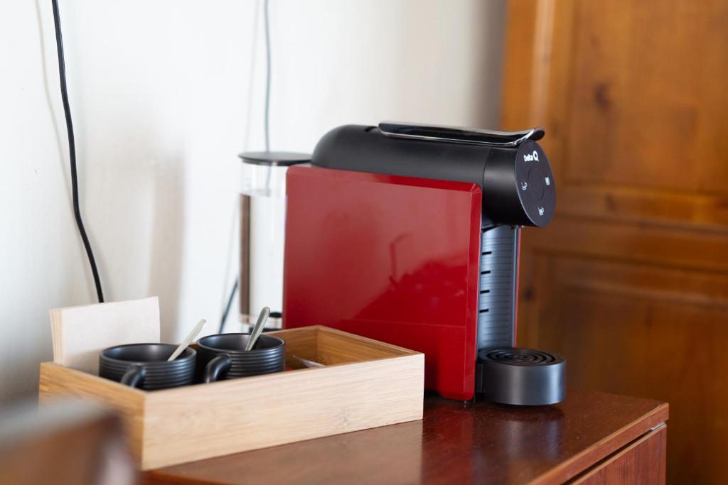 a printer sitting on top of a wooden table at Tamahuche Hotel Rural in Vallehermoso