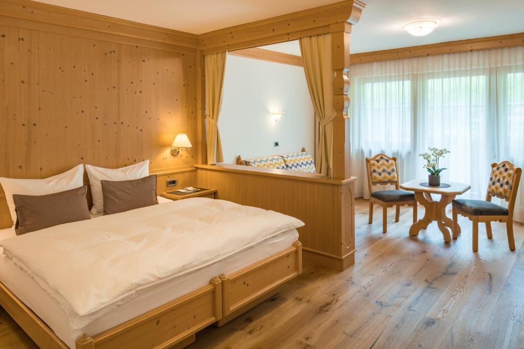 Postel nebo postele na pokoji v ubytování Hotel Christoph